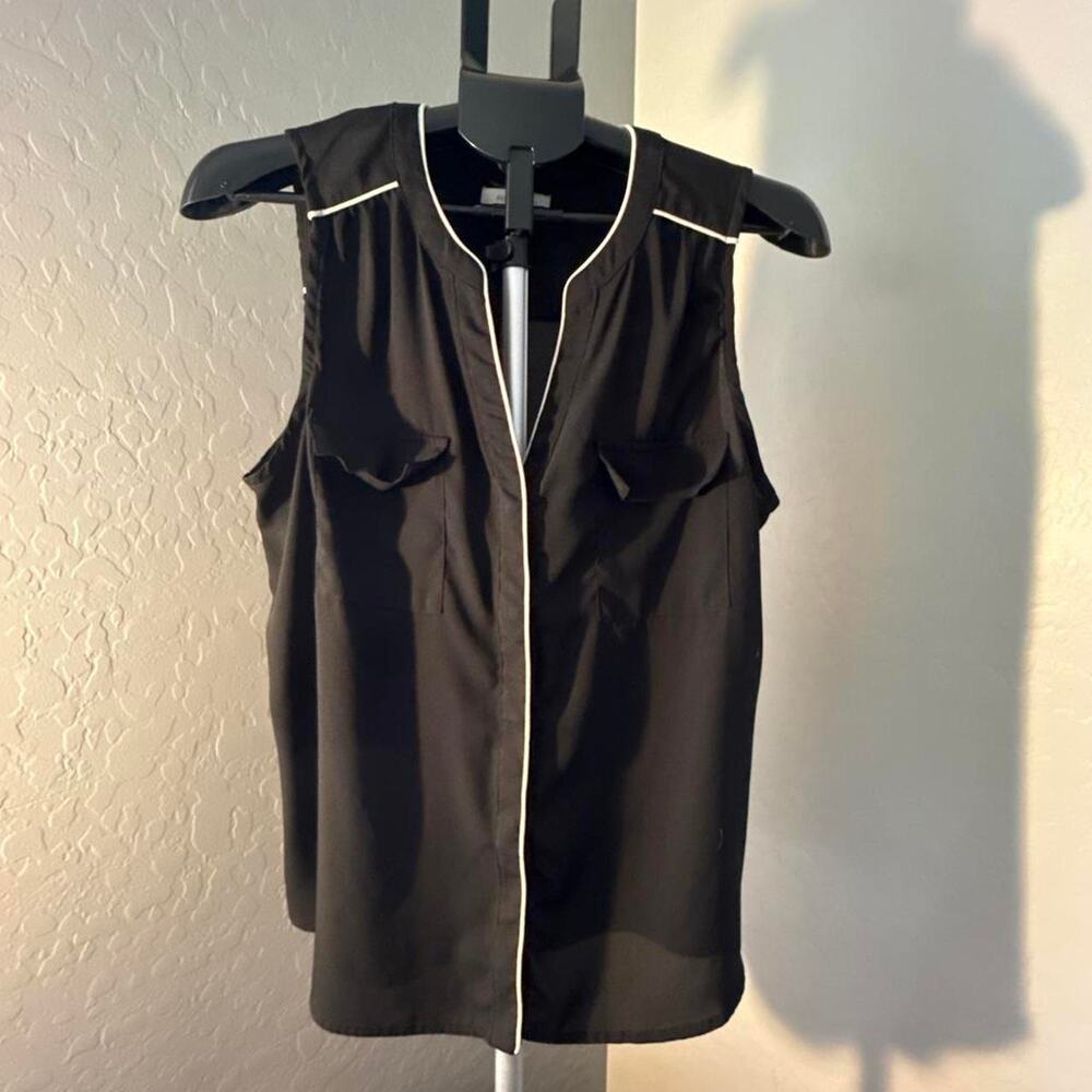 Black button down sleeveless top